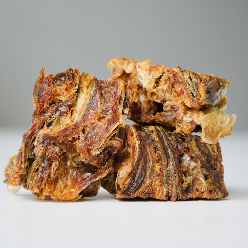 Close-up of Healthybud Cod Skin Cubes - crunchy, air-dried treats with wild-caught Pacific cod skins.